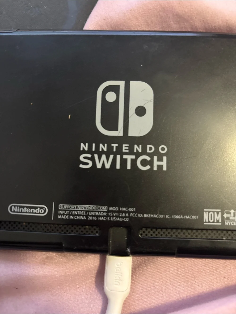 Fully workingNintendo Switch with White Left Joy-Con and Turquoise Right Joy-Con